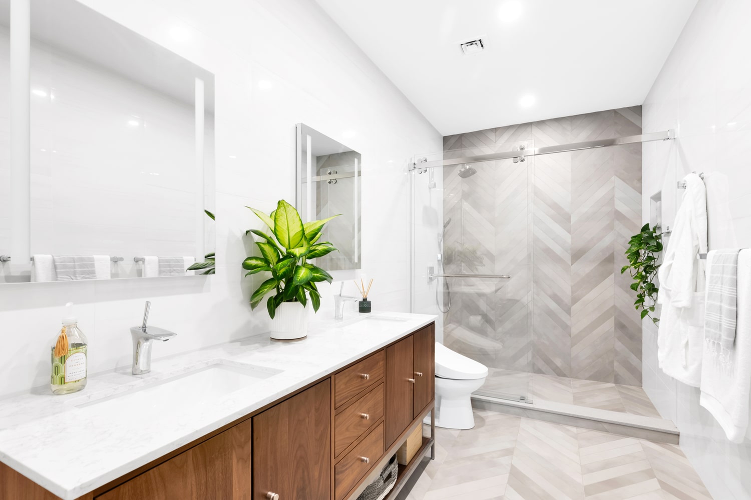 Bathroom remodel showcasing large walk-in shower and modern vanity