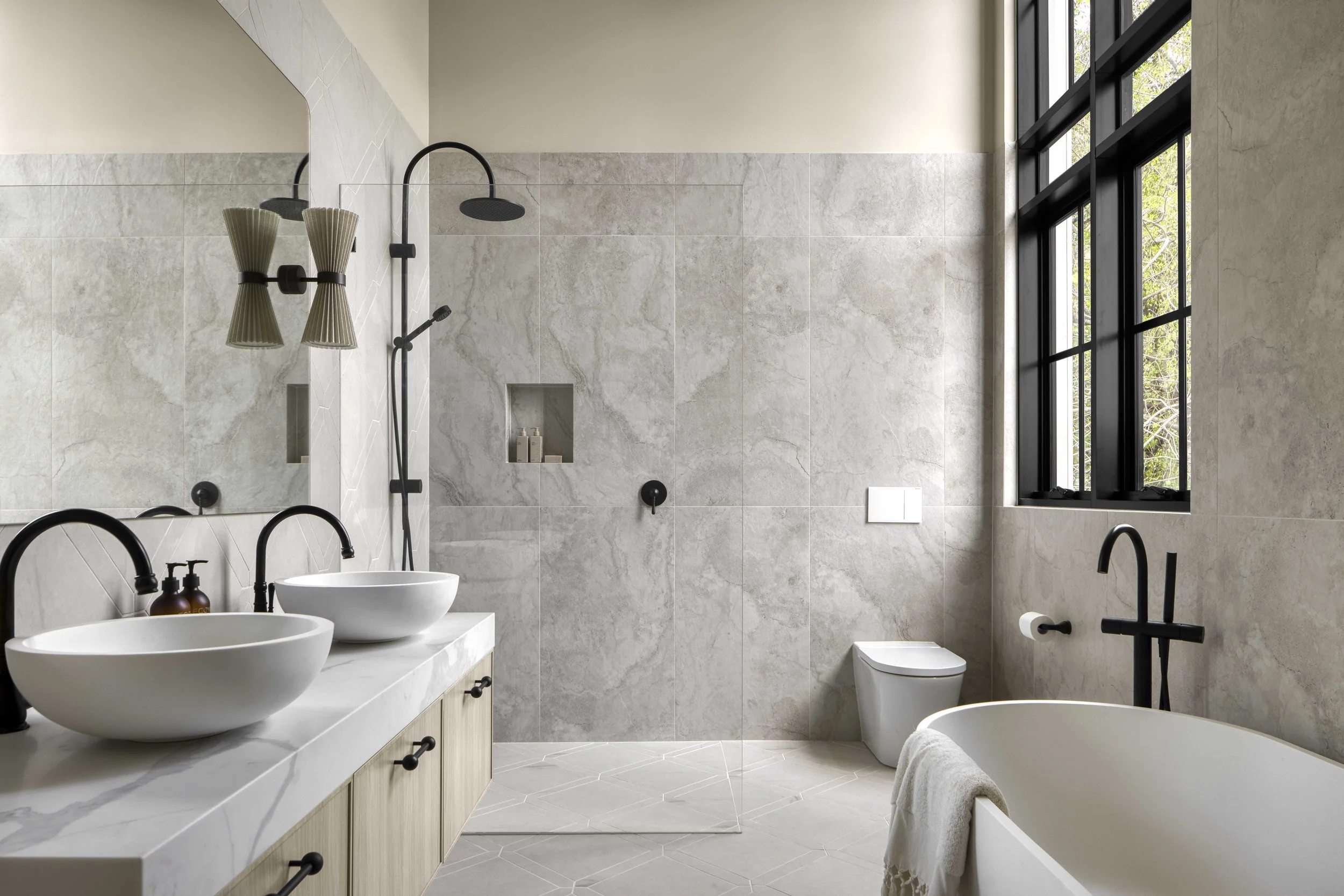 Contemporary bathroom with walk-in shower and sleek finishes