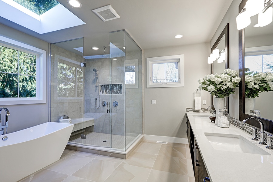 Bright Ottawa bathroom renovation with freestanding tub and double vanity